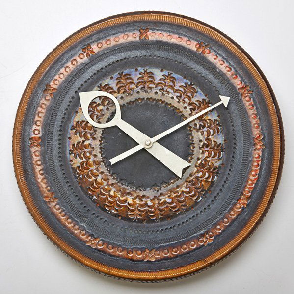 GEORGE NELSON; RAYMOR: Wall clock with incised decoration, USA, 1950s/60s; Glazed earthenware, enameled metal; Unmarked; 14" dia. x 2 1/4"