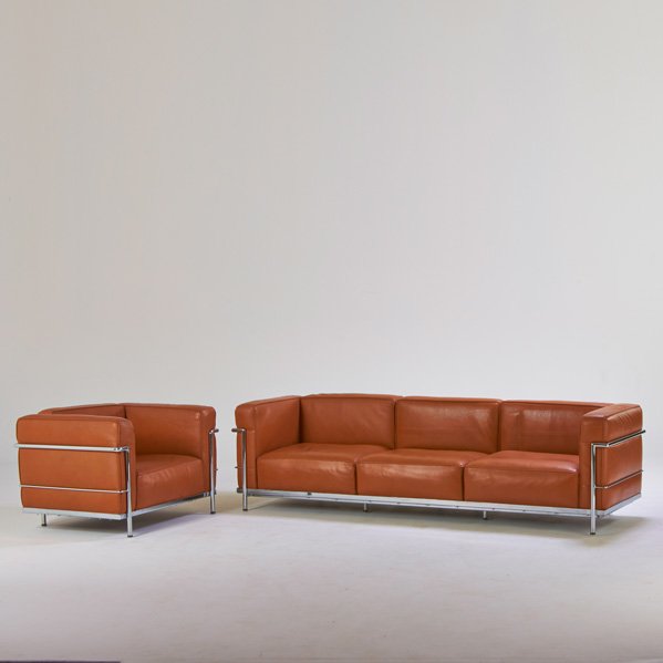 LE CORBUSIER: Sofa and lounge chair, 1990s; Chromed steel, leather; Unmarked; Sofa: 26" x 92" x 29", chair: 26" x 39" x 29"