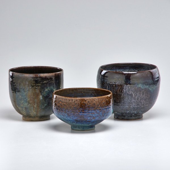 EDWIN AND MARY SCHEIER: Three stoneware pieces: bowl, coupe with incised figures, and coupe in dark brown glaze, USA, second half 20th c.; All signed: Coupe with figures: 6" x 6 3/4" dia.