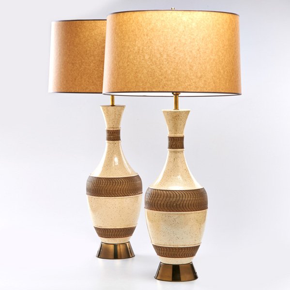 F.A.I.P: Pair of ceramic table lamps with brass fittings and bases, decorated with incised bands, USA, mid 20th c.; Both unmarked; To finial: 35 1/2" x 9" dia.
