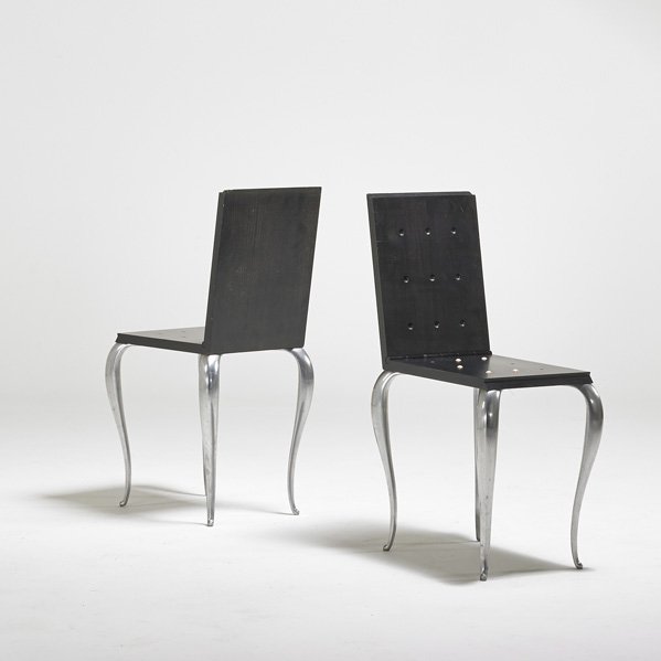 PHILIPPE STARCK; DRIADE: Pair of Lola Mundo chairs, France/Italy, 1980s; Mahogany, cast aluminum, rubber; Unmarked; 19 1/4 x 18" x 13 1/2"