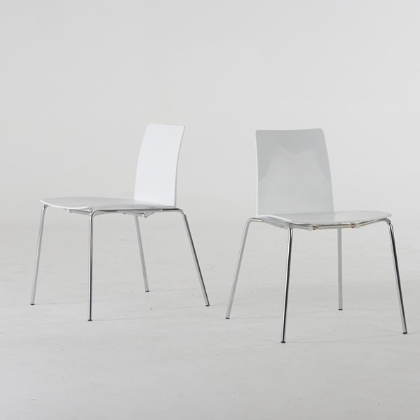 C. COLOMBO; MOROSO: Pair of LEAF stacking chairs, Italy, 2000s; Plastic, chromed steel; Raised signatures; 30" x 20 1/2" x 23"