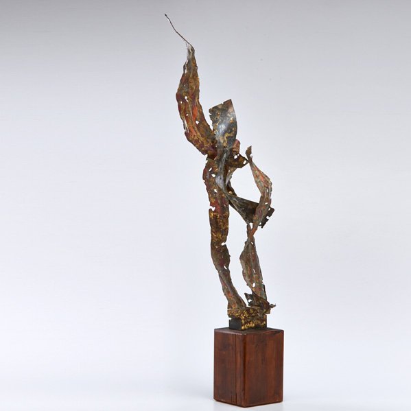 STYLE OF SILAS SEANDEL: Patinated brass abstract sculpture on a wooden base, USA, 1970s, Unmarked; 39 1/2" x 5" sq.