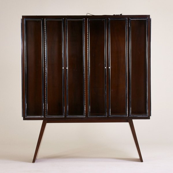DREXEL: Illuminated vitrine, USA, 1960s; Walnut, ebonized wood, chromed steel, glass; Stenciled markings; 79 1/2" x 69 1/2" x 16"