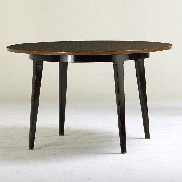 EDWARD WORMLEY; DUNBAR: Extension dining table, Berne, IN, 1950s; Mahogany, laminate, brass; Brass D-label; 29 1/2" x 48" dia., inserts: 15"