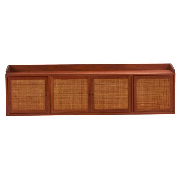 EDWARD WORMLEY; DUNBAR: Wall-hanging cabinet, Berne, IN, 1960s; Walnut, wicker; Brass label; 19 1/2" x 67 1/2" x 14"