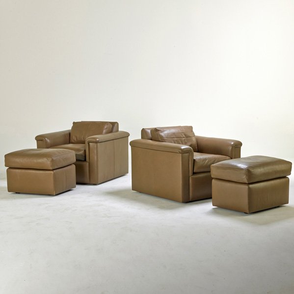 J. ROBERT SCOTT INC.: Pair of club chairs and ottomans, Englewood, CA, 1990s; Leather, casters on ottomans; All with upholstery labels; Lounge chairs: 29" x 38â€ sq., ottomans: 19" x 27" x 20â€