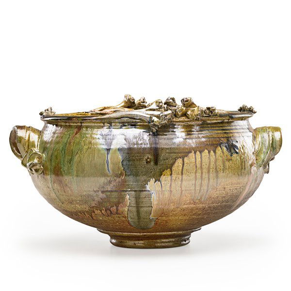 DON REITZ Glazed stoneware bowl: DON REITZ (b. 1929) Glazed stoneware handled bowl with applied decoration, Alfred, NY; Signed; 8 1/2" x 15 1/2" Provenance available: Original receipt