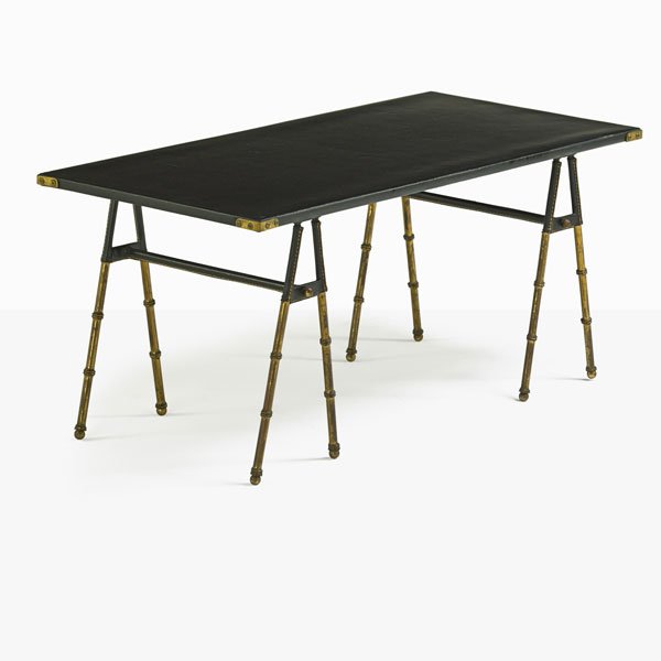 JACQUES ADNET Coffee table: JACQUES ADNET (1901 - 1984) Coffee table, France, 1960s; Stitched leather, brass; Unmarked; 18" x 41 3/4" x 19"