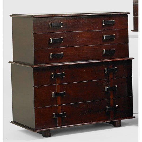 PAUL FRANKL Station Wagon tall dresser: PAUL FRANKL (1886 - 1958) JOHNSON FURNITURE CO. Tall Station Wagon dresser, USA, 1940s; Mahogany, ebonized wood, brass; Stenciled markings, branded, retailer brass labels; 45" x 42" x 22"
