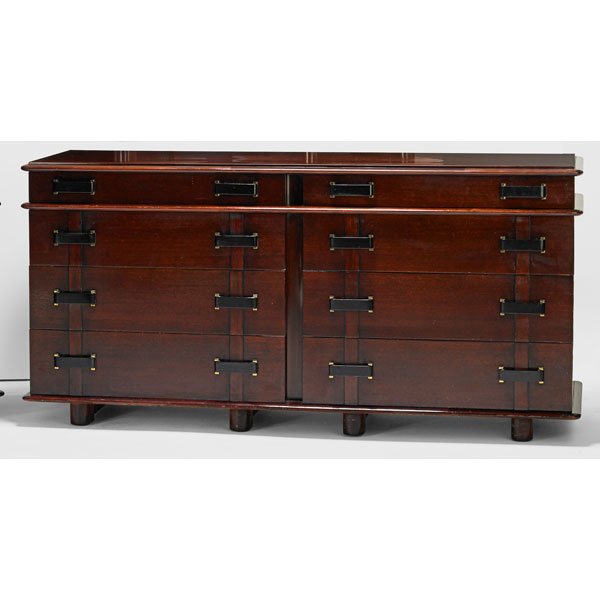 PAUL FRANKL Station Wagon long dresser: PAUL FRANKL (1886 - 1958) JOHNSON FURNITURE CO. Long Station Wagon dresser, USA, 1940s; Mahogany, ebonized wood, brass; Stenciled markings, branded, retailer brass labels; 32" x 66" x 22"