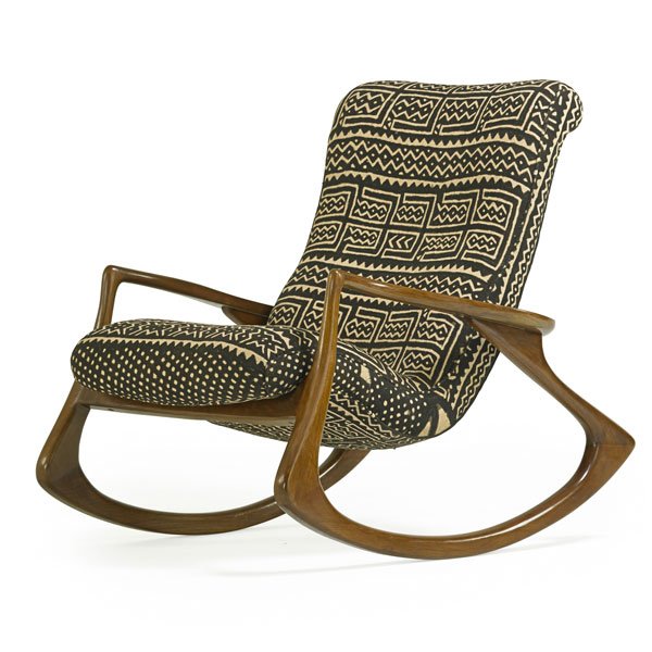 VLADIMIR KAGAN Contour rocking chair: VlADIMIR KAGAN (b. 1927) VLADIMIR KAGAN DESIGNS INC Contour rocking chair (no. 175F), USA, 1970s; Mali mud cloth upholstery; Upholstery label; 38" x 31 1/2" x 43"