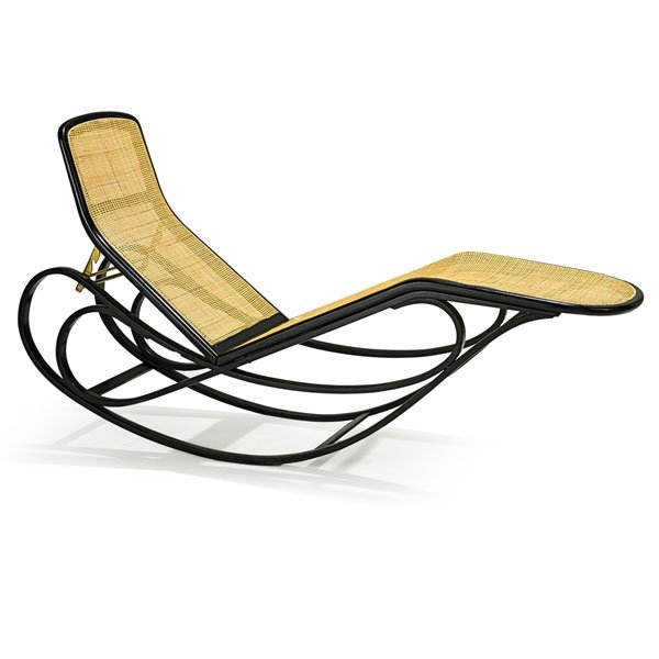 EDWARD WORMLEY; DUNBAR Rocking chaise: EDWARD WORMLEY (1907 - 1995) DUNBAR Adjustable rocking chaise, Berne, IN, 1950s; Stained and lacquered ash, brass, cane; Unmarked; As shown: 37" x 21" x 68"
