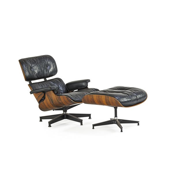 EAMES; HERMAN MILLER Lounge chair and ottoman: CHARLES EAMES (1907 - 1978) RAY EAMES (1912 - 1988) HERMAN MILLER Lounge chair and ottoman (no. 670 and 671), Zeeland, MI, 1950s; Rosewood, leather, enameled aluminum, enameled steel, rubber; Paper la