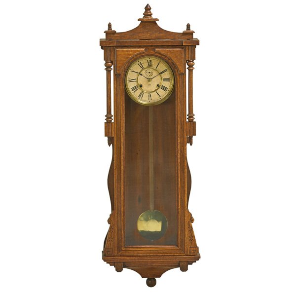 ANSONIA WALL REGULATOR CLOCK: Oak case, time and strike eight day movement, 19th c.; 47 1/2" x 16"