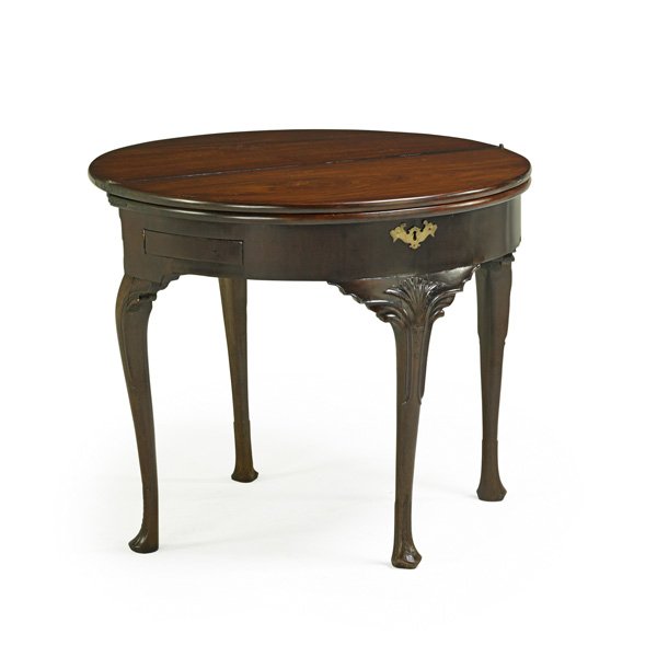 IRISH GEORGE II TRIPLE TOP GAMES TABLE: Mahogany with D-shaped hinged top opening to a plain surface, baize lined surface with chip wells and leather inset backgammon board, shell carved cabriole legs to leaf carved pad feet, 18th c.; 29" x