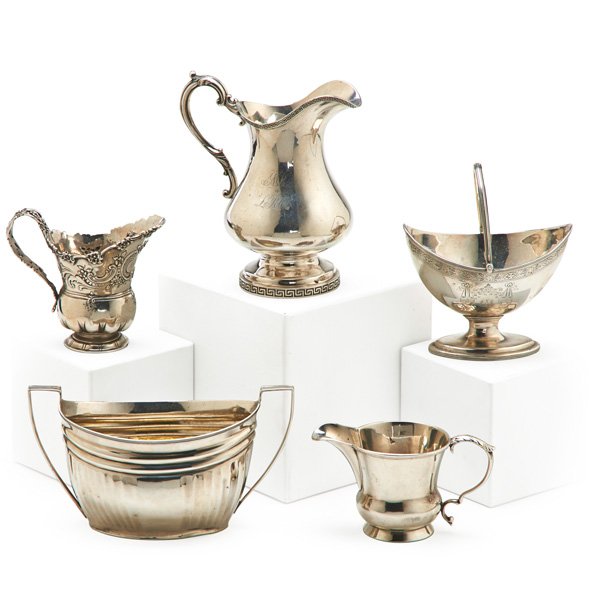 ENGLISH AND AMERICAN STERLING HOLLOWWARE: Five pieces, 18th/19th c.: Tiffany & Co. sterling pitcher #11028T2746, ca. 1892; Samuel Kirk cream pitcher, ca. 1800; small coin silver pitcher; Clement Cheese swing handled sugar basket, 1793; and su
