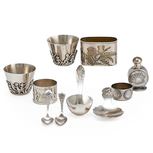 AMERICAN SILVER ACCESSORIES: Ten items, 1860-1930: Tiffany & Co. "Sagamore" flask base, Duhme & Co. "Homeric" caddy spoon, Shreve "14th Century" pattern napkin ring, (2) Jos. Heinrich coffee spoons, Galt & Bros. sauce ladle, Shre