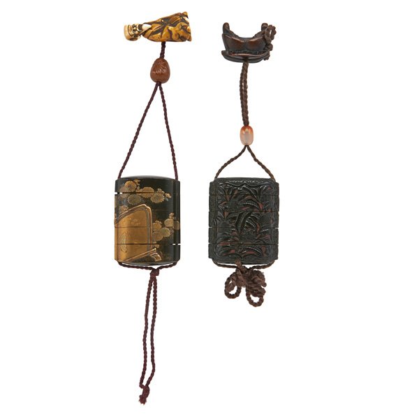 JAPANESE INRO: Two, both in wood, with ojime and netsuke, 19th/20th c.: one with carved foliate design, the other lacquered with enameled floral decoration; Each: 2 3/4" (without cord)