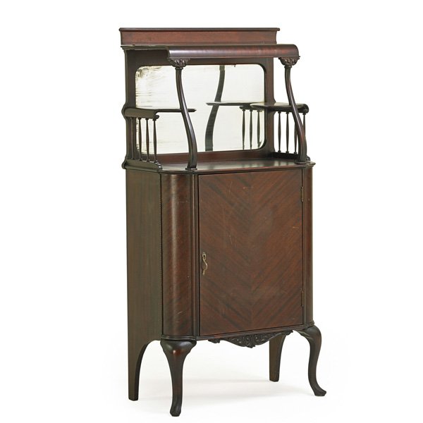 VICTORIAN SHEET MUSIC CABINET: Mahogany with mirrored back, late 19th c.; 57" x 28" x 16 1/2"