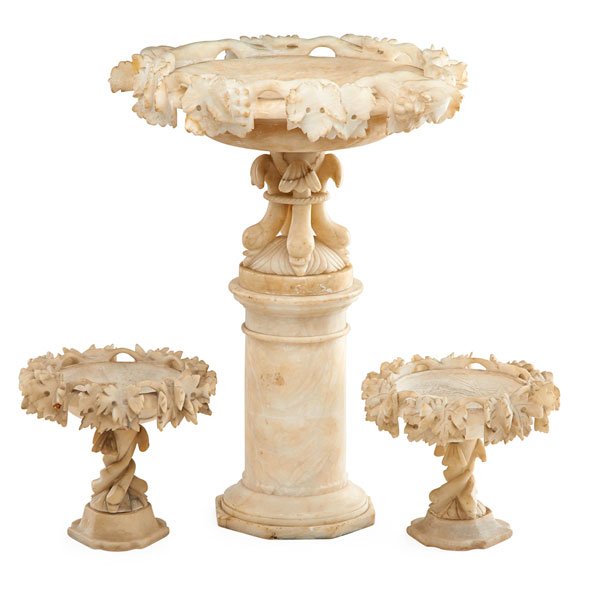 CONTINENTAL ALABASTER CENTERPIECE: Three section pedestal base compote flanked by a pair of smaller compotes with dolphin form supports, probably Italian, ca. 1900; Tallest: 22 1/4" x 18"