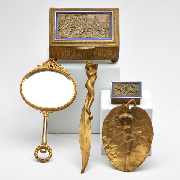 GILT BRONZE: Assembled dresser set: letter opener, pin tray, mirror, match safe, jewelry box, France, early 20th c.; Tray and letter opener signed; Jewelry box: 2 1/2" x 5 3/4" x 4 1/4"