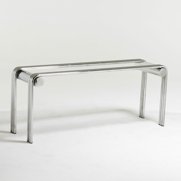 STYLE OF MILO BAUGHMAN: Console table, 1970s; Chromed steel, glass; Unmarked; 24" x 58" x 16"