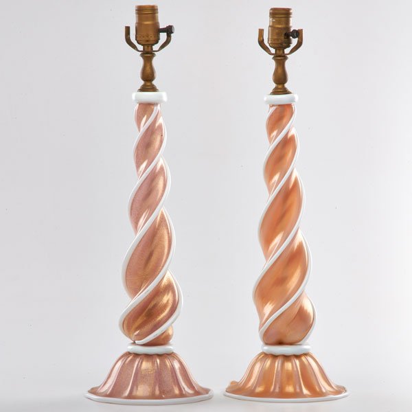 ARCHIMEDE SEGUSO: Two table lamps with spiral shafts and fluted bases, Italy, 1950s; Blown glass, single sockets; Remnants of Made in Italy sticker to one; 21 1/2" x 7"