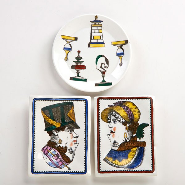 PIERO FORNASETTI: Small plate with chess pieces and two small trays with dual heads, Italy, 20th c.; Ink stamped Fornasetti Milano/Made in Italy; Plate: 3/4" x 5 1/2" dia.