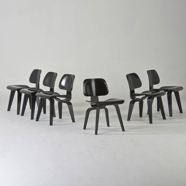 CHARLES AND RAY EAMES; HERMAN MILLER: Six dining chairs (DCW), USA, 1990s; Black enamel over wood; Painted over metal tags; Each: 28 1/2" x 19 1/2" x 22"