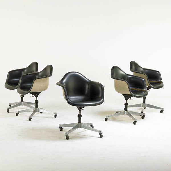 CHARLES RAY EAMES; HERMAN MILLER: Five armchairs, Zeeland, MI, 1960s; Vinyl, plastic reinforced fiberglass, enameled steel, aluminum, casters; Raised signatures; 33 1/2" x 25" x 24"