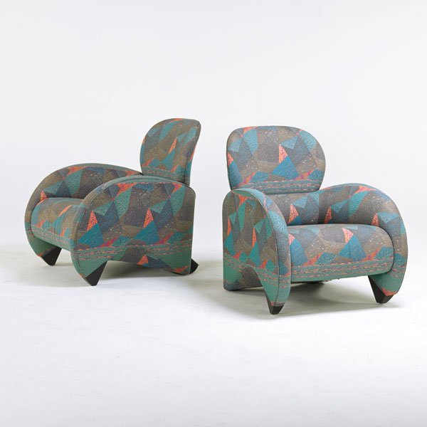 DeSEDE: Pair of lounge chairs, Switzerland, 1990s; Upholstery, ebonized wood; Unmarked; Each: 35" x 31" x 36"