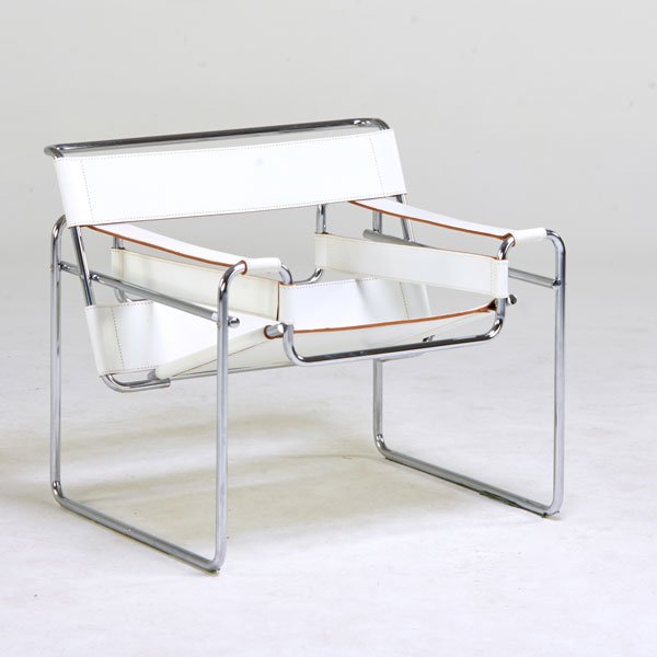 MARCEL BREUER: Wassily chair, Italy, 1960s; Chromed steel, stitched leather; Labeled Made in Italy; 28" x 31" x 28"