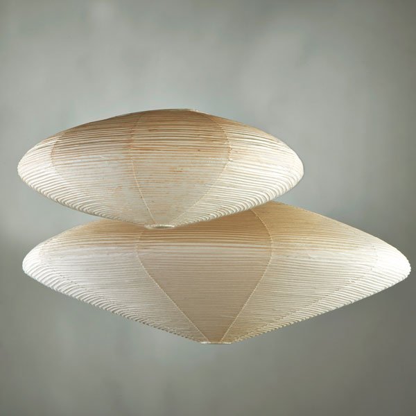 ISAMU NOGUCHI; AKARI: Light sculpture shades in original box, missing metal frames and fixtures, Japan, 1960s; Rice paper, bamboo; Both shades signed; Larger: 33 1/2" dia