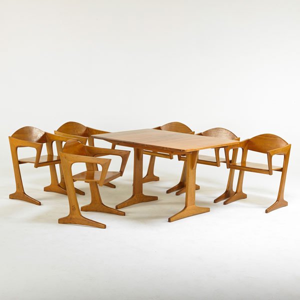 RAPHAEL TELLER: Trestle dining table and six armchairs, USA, 1971; Pennsylvania Appalachian cherry wood; Signed with artist's cypher; Dining table closed: 29" x 48" x 36", two 12" leaves, chairs: 29 1/2" x 21" x 20 1