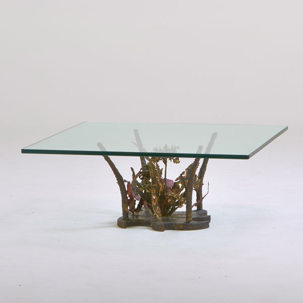 SILAS SEANDEL: Sculptural coffee table, New York, 1970s; Welded, textured and patinated bronze and glass; Unmarked; 15 1/2" x 39 1/2" x 39 1/2"