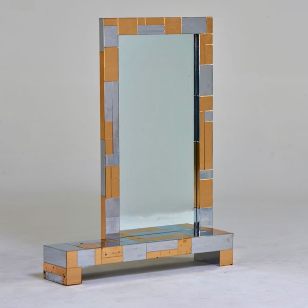 STYLE OF PAUL EVANS: Mirror/console, USA, 1970s; Chromed steel, brass, mirror; Unmarked; 46" x 36" x 8"