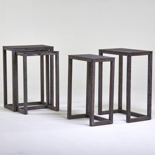 STYLE OF JEAN-MICHEL FRANK: Matched pair of nesting consoles, USA, 1980s; Cerused oak; Unmarked; Tallest: 34 1/2"
