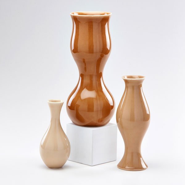 EVA ZEISEL; KLEINREID: Upright Trio" consisting of three graduated porcelain vases, New York, 2000s; All signed; Tallest: 12