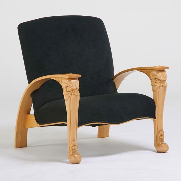 K. NIELSON: Birch lounge chair with chip carved faces, upholstered seat and back, 1996; Signed and dated; 35 3/4" x 30 1/4" x 33"