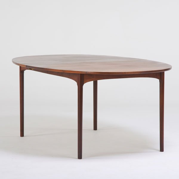SCANDINAVIAN: Teak extension dining table with two leaves, ca. 1960s; Unmarked; Closed: 29" x 72 1/2" x 48" dia., two 20" leaves