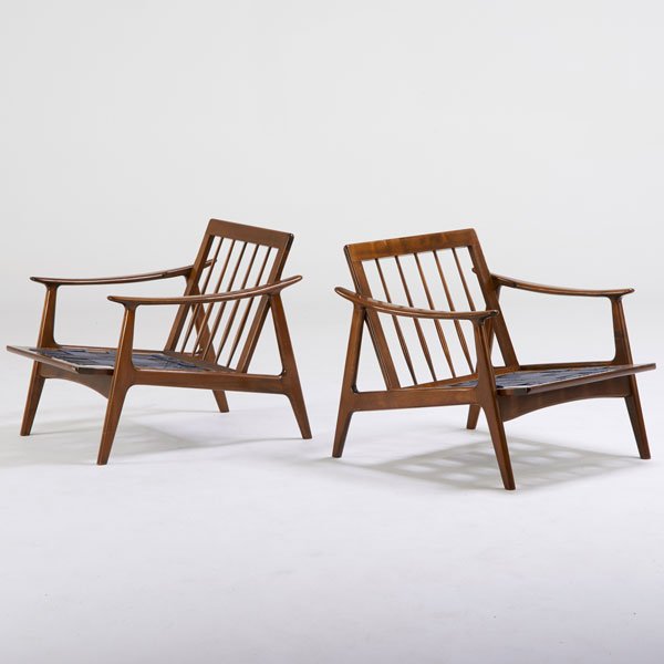 DANISH: Two lounge chair frames, 1960s; Walnut; Marked Made in Denmark; Each: 26 1/2" x 27 1/2" x 30 1/2"