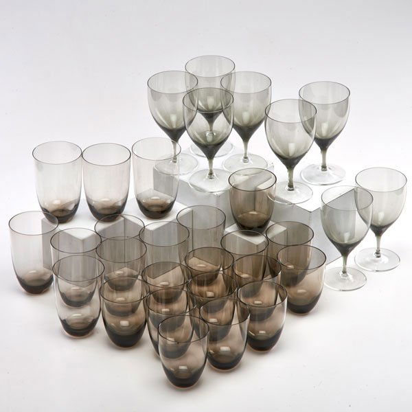 HOLMEGAARD: Thirty-one smoked glass drinking glasses: eight goblets, ten large, and thirteen small tumblers, Denmark, second half 20th c.; All unmarked; Taller: 4 3/4"