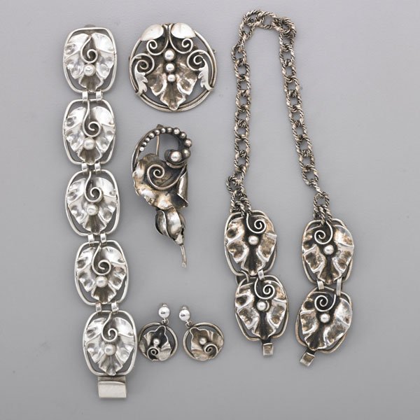 SUITE OF STERLING JEWELRY BY ALPHONSE LAPAGLIA: Six pieces: Forged leaves with tendril and shot decoration, ca. 1955, includes 7" bracelet, 1 3/4" brooch, 2 3/4" brooch, 1 1/4" pair of earrings, 15 1/2" cape clasp; Most marked "LaPaglia Hand Wrough