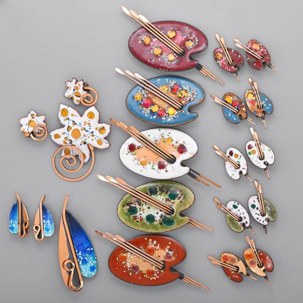 MATISSE/RENOIR ENAMELED COPPER BROOCHES & EARRINGS: Twenty-one pieces: "Palette", "Leaf" and "Lilly" designs in gemstone and white; Mid 20th c.; All pieces marked "Matisse Renoir" or "Matisse"; Largest 1 3/4" x 2 3/4"