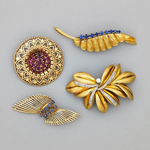 FOUR JOSEPH WOLF GEMSTONE OR DIAMOND BROOCHES: Yellow gold with textured finish: 18k foliate brooch, white gold topped sprays of bead set diamonds .15 cts. TW; 14k circular brooch with pierced design and central ruby cluster; 14k fan brooch centra