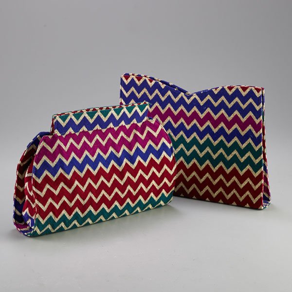 TWO VINTAGE MISSONI CLUTCHES: Billfold and clutch, in purple, red, pink, green and metallic gold chevron pattern, with snap closures; Clutch 7" x 10" x 2 1/2", billfold 7 1/4" x 10 1/4" x 1 1/4"