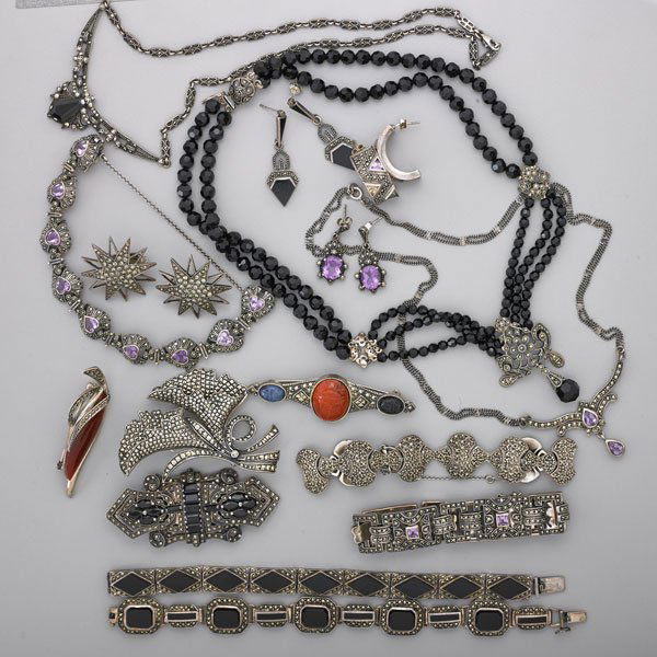 COLLECTION OF MARCASITE AND SILVER JEWELRY: Twenty pieces: Five marcasite bracelets set with amethyst or onyx inlay; Four marcasite brooches, three with hardstone, includes one Art Deco double clip brooch with onyx; Four pairs of post back marc