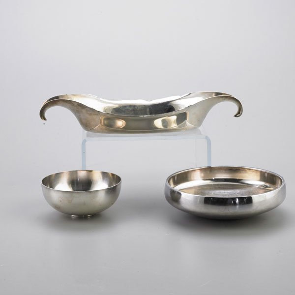 THREE MODERN STERLING BOWLS: Georg Jensen bowl, Piet Hein, Denmark, ca. 1950, 2" x 4 1/4"; Georg Jensen bowl, Henning Koppel, Denmark, ca. 1945-1980, 1 3/4" x 6 1/2"; Sterling vegetable dish, The Watson Company, Attleboro, MA, 18