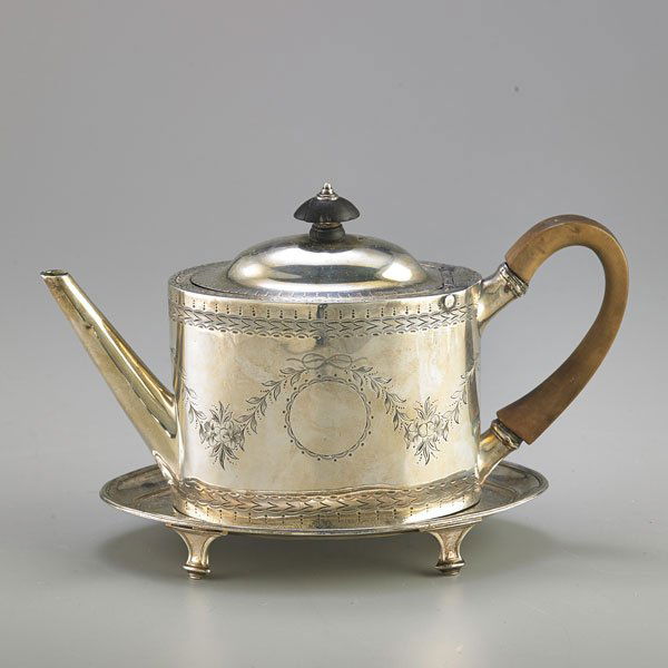 TWO PIECES OF ENGLISH SILVER: Oblong teapot stand with armorial lion's head, Hester Bateman, London, 1827; Oval teapot with wood handle, Robert Hennell II, London, 1786; 18th-19th c.; 19.1 OT